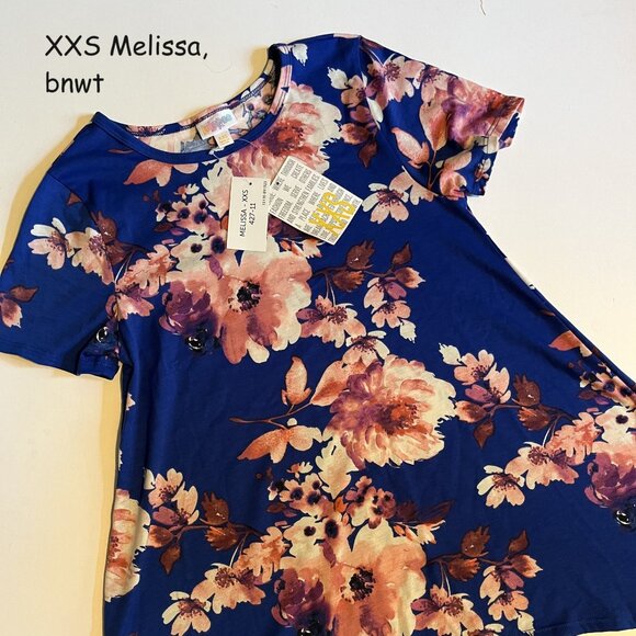 LuLaRoe Tops - XXS Lularoe Melissa shark bite tunic top, blue with pink flowers